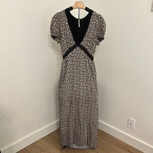 Free People | Elegant Black and Cream Patterned Dress